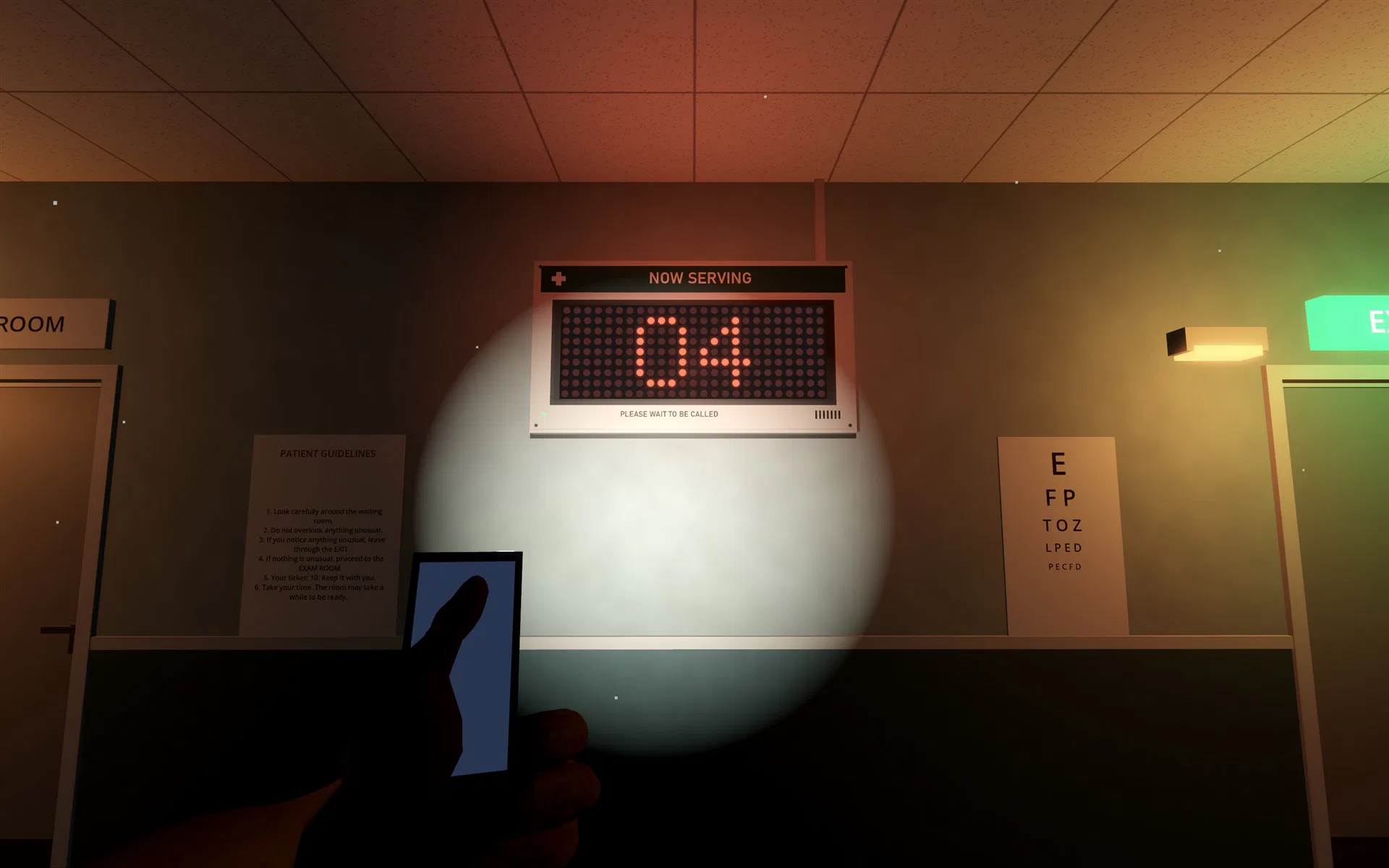 The clinic in darkness, lit by a torch